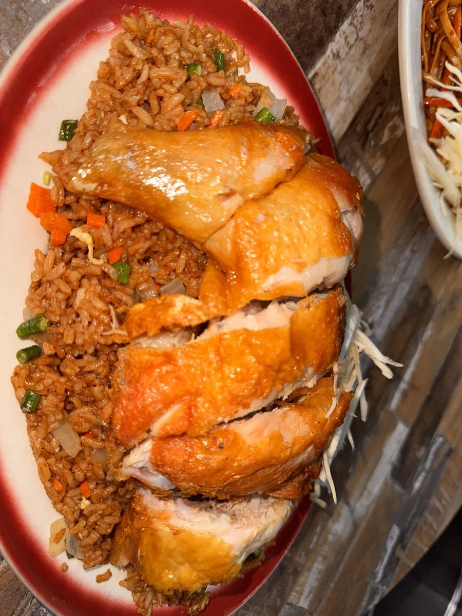 Chicken fried rice with roast chicken at Little Guyana Restaurant